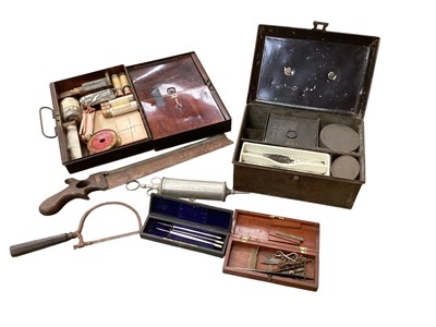 Lot 2980 - Group of antique medical equipment, including first aid and apothecary boxes with contents, bone saw, etc