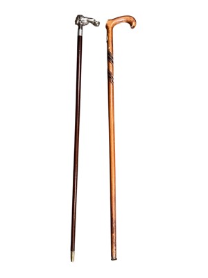Lot 3001 - Contemporary Continental silver (925) mounted walking stick, the handle modelled as a lady's head, together with another stick, (2).