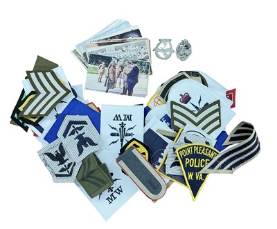 Lot 803 - Two Nazi German badges, military cloth badges and military postcards, (1 box).