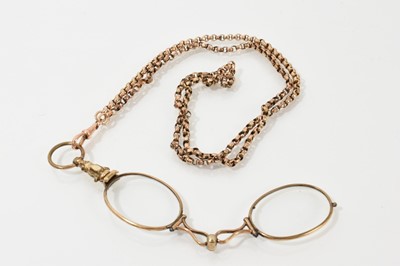 Lot 652 - Victorian gilt metal / pinchbeck lorgnette on a yellow metal chain