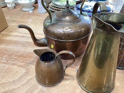 Lot 5024 - Three copper jugs and a copper kettle (4)