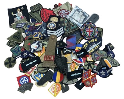 Lot 738 - Large collection of mainly British and American cloth military badges, (1 box).