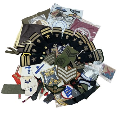Lot 739 - Large collection of mainly British and American cloth military badges and uniform epaulettes, (1 box).