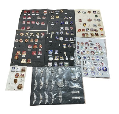 Lot 741 - Collection of eight boards, each mounted with various American military badges, (1 box).