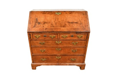 Lot 1375 - 18th century walnut bureau with two short and three long drawers, on bracket feet
