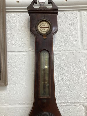 Lot 5067 - Two brass cased carriage clocks, a French brass cased and porcelain clock and a 19th century mahogany cased banjo barometer (4)