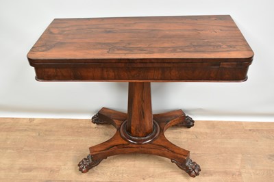 Lot 1367 - Early Victorian rosewood card table, on faceted column and carved claw feet