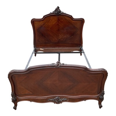 Lot 1363 - Early 20th century French walnut double bed with carved crestings