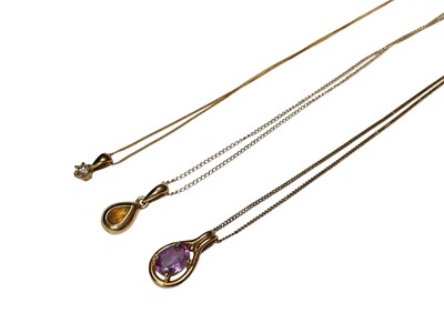 Lot 161 - Diamond pendant, citrine pear shaped pendant and an amethyst pendant, all in 9ct gold mounts on 9ct gold chains