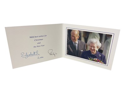 Lot 40 - H.M. Queen Elizabeth II and H.R.H. The Duke of Edinburgh, signed 2000 Christmas card with twin gilt cyphers to cover, colour photograph of the smiling Royal couple to the interior, signed 'Elizabe...