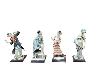 Lot 2323 - Four Florence Giuseppe Armani clowns, tallest 47cm high, all boxed