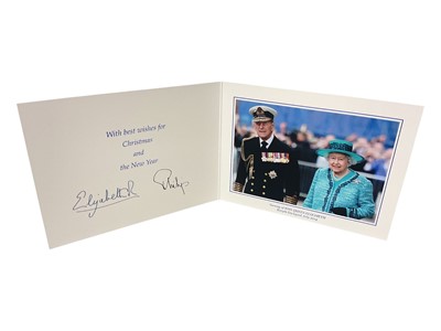 Lot 46 - H.M. Queen Elizabeth II and H.R.H. The Duke of Edinburgh, signed 2014 Christmas card with twin gilt cyphers to cover, colour photograph of the smiling Royal couple at the naming ceremony for HMS Q...