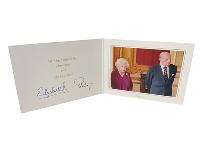 Lot 49 - H.M. Queen Elizabeth II and H.R.H. The Duke of Edinburgh signed 2019 Christmas card with twin gilt cyphers to cover, colour photograph of the Royal couple to the interior, signed 'Elizabeth R Ph...