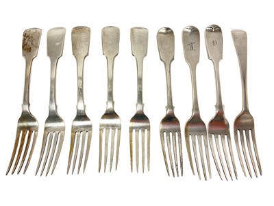 Lot 394 - Georgian / Victorian silver Fiddle pattern dinner forks, including one Irish and one other Old English pattern