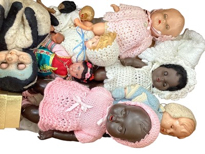 Lot 1879 - Box of large and small plastic dolls, composite doll with flirty eyes, Steiff Fox 1544/35 and other items.