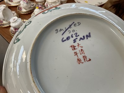 Lot 5021 - Antique Chinese porcelain dish with Guangxu mark, painted in enamels with flowers, together with a Chinese pewter cup engraved with a dragon, and a cloisonné walking stick handle (3)