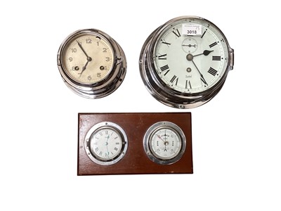 Lot 3018 - Sestrel chrome cased ship's bulkhead wall clock, together with another smaller made in Germany, and a Sestrel combination clock and barometer (3)