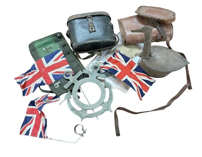 Lot 849 - Two pairs of military binoculars, metal anchor photograph frame, Lee Enfield .303 rifle cleaner kit, tin trench art duck, 2 pairs regimental flashes, military button and cap badge, (1 box).