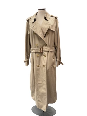Lot 2562 - Women's Burberry Trench Coat size 14, long, and hat