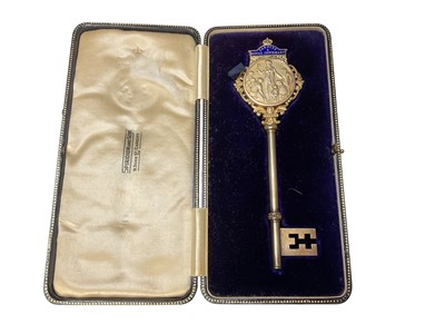 Lot 195 - 1920s silver gilt and enamel presentation key for Cardiff Royal Infirmary, in fitted case