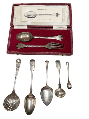 Lot 196 - Silver spoon and fork in fitted case, together with a silver sifter spoon and four other silver spoons