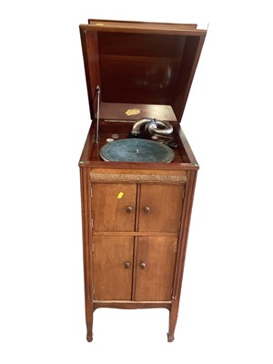 Lot 2729 - Gramophone in cabinet together with pianola rolls in cabinet, (2).