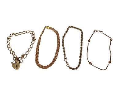Lot 233 - 9ct gold curb link bracelet with padlock clasp and three other 9ct gold bracelets (4)