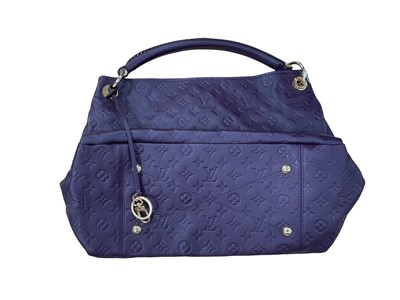 Lot 2567 - Louis Vuitton Artsy purple leather shoulder handbag, purchased from Louis Vuitton, London, circa 2011, with cloth outer bag