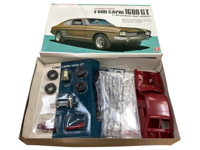 Lot 1899 - Bandai Dynamics Series 1:20 scale motorised Ford Capri 1600 GT model kit, boxed 6019 and two associated books (3)