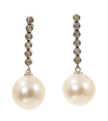 Lot 641 - Pair of diamond and cultured pearl pendant earrings in 9ct white gold setting