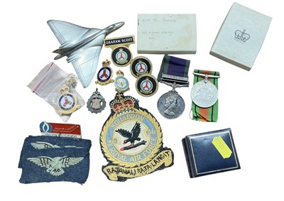Lot 826 - Elizabeth II General Service medal (Post 1962 type) with Borneo clasp named to CPL. G. Scott. (682143) RAF, together with box of issue, Second World War Defence medal and various badges.