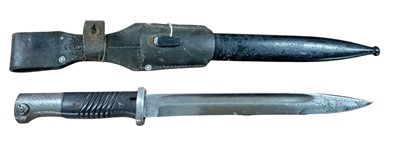Lot 828 - Second World War Nazi German M84/98 bayonet with steel blade stamped 41crs, in steel scabbard with leather frog.