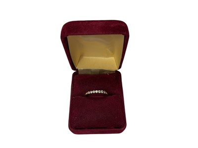 Lot 247 - Diamond seven stone ring in yellow metal setting, size N