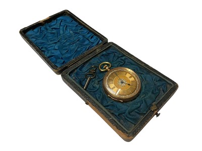 Lot 266 - Continental 14ct gold fob watch with engraved foliate scroll decoration in fitted box