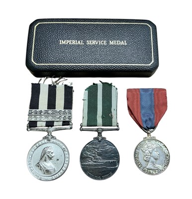 Lot 832 - George VI and later medal trio comprising George VI Royal Naval Reserve Long Service and Good Conduct medal named to 7432 C. Nelson. S.B.P.O. R.N.A.S. B.R.