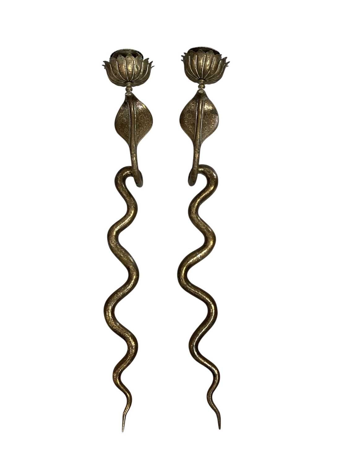 Lot 5107 - Pair of Indian brass wall-mounted snake candle holders