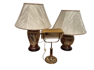 Lot 5056 - Bankers' lamp with an amber shade, together with two other lamps