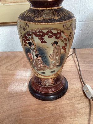 Lot 5056 - Bankers' lamp with an amber shade, together with two other lamps