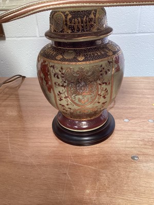 Lot 5056 - Bankers' lamp with an amber shade, together with two other lamps