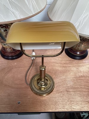 Lot 5056 - Bankers' lamp with an amber shade, together with two other lamps