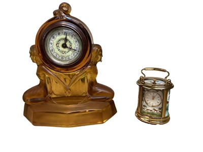 Lot 5058 - Halcyon Days James Purdey clock and an Art Deco glass clock