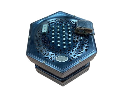 Lot 2743 - Antique Wheatstone concertina, serial no.31449, with 48 buttons, ebony fretwork ends, in original leather carry case
