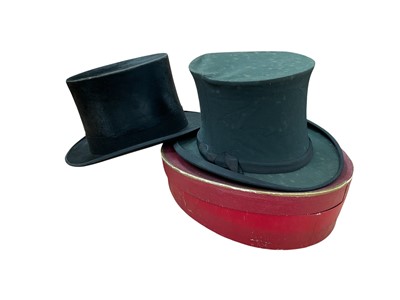 Lot 2573 - Black top hat by Cuthbertson, London plus a boxed black collapsible top.