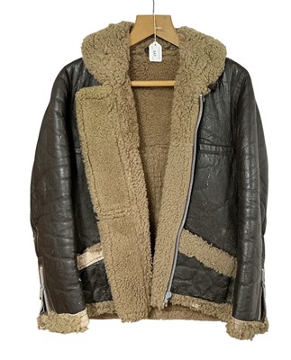 Lot 843 - Vintage leather and sheepskin flying jacket with label to interior '42'.