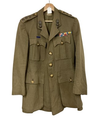 Lot 844 - 1920's Royal Welch Fusiliers Colonel's jacket with rank insignia, mounted medal ribbons and regimental badges and buttons, Conway Williams label to interior dated 11.2.24.