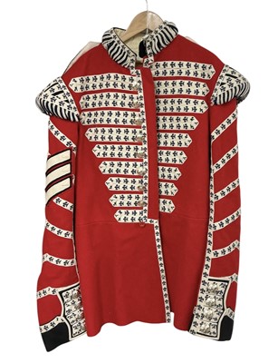 Lot 845 - Elizabeth II Grenadier Guards drummer's tunic with regimental badges and rank insignia.