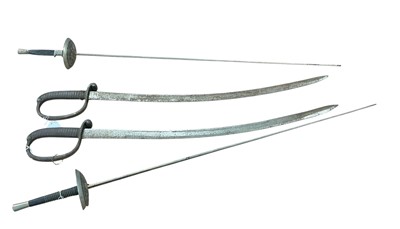 Lot 856 - Pair of Middle Eastern cavalry type swords, the blades with traces of eastern script, together with two fencing foils, (4).