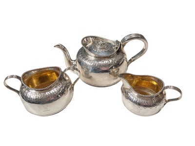 Lot 299 - Late Victorian silver three piece tea set (London 1900)