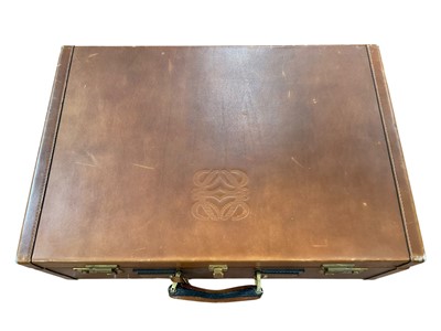 Lot 2583 - Loewe good quality tan leather fitted suitcase, embossed Loewe logo on lid, combination locks. 60cm width x 40cm depth x 20cm height approx. Plus a Loewe canvas outer cover.