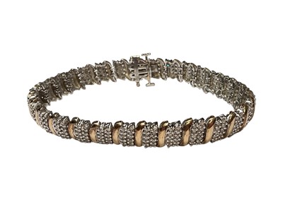 Lot 301 - 9ct gold diamond set bracelet